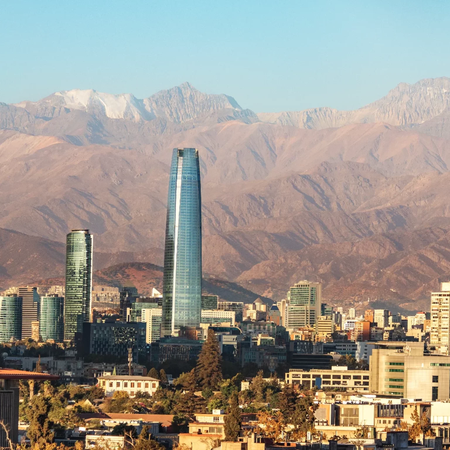 aaerial-view-of-santiago-skyline-at-sunset-with-an-2022-03-15-19-44-00-utc (1)